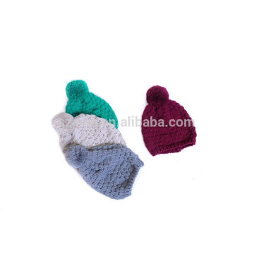 Sombrero de acrílico del pom pom del knit del color sólido del invierno de las mujeres